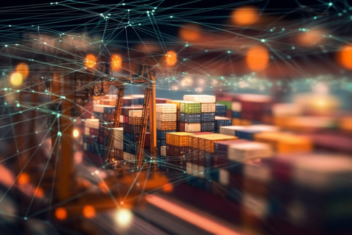 ネットワークでつながる港のコンテナとガントリークレーン